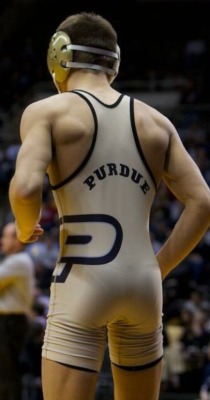 jockbrad:  Swimmers, wrestlers, football players / singlets, jockstraps, speedos and spandex! http://jockbrad.tumblr.com/