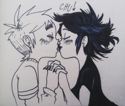 Noodle kissing 2D, both in black lipstick and blue lipstick. 