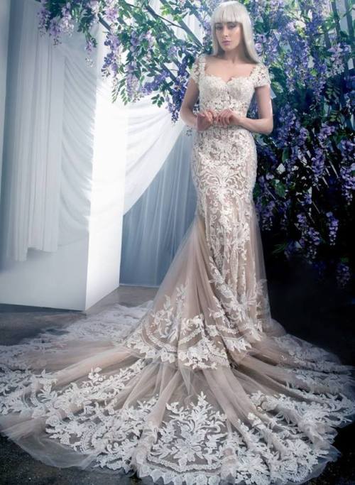 designerbridalroom:Ysa Makino | A striking two-toned wedding dress with beaded lace embroidery detai