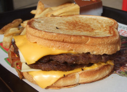 fatty-food:  20100316 Double Grilled Cheese Bacon Burger (by Tom Spaulding)  Gonna have to demand someone feed me a few of these right now