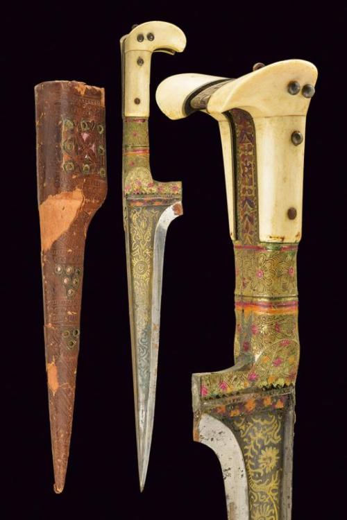 armthearmour:A lovely Chara or Khyber Knife with brass floral motiffs and ivory handle scales shaped