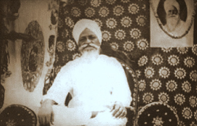 Baba Somanath pictured. And a photo of Hazur Baba Sawan Singh Ji is hanging on the wall in the background.