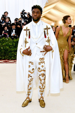 wesleygasm:Chadwick Boseman attends the Heavenly Bodies: Fashion &amp; The Catholic Imagination Costume Institute Gala at The Metropolitan Museum of Art on May 7, 2018 in New York City.