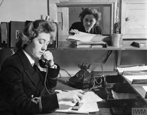 WRNS with the Fleet Mail (England, November 1944):Just visible through the grid of sorting compartme
