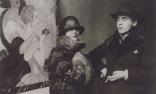 gnossienne: Gerda and Einar Wegener in front of Gerda’s painting “Sur la route d'Anacapri” at an exh