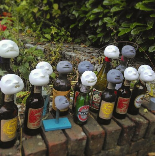 Priming faces in the garden. Fortunately, I had an abundance of empty bottles to hand&hellip;