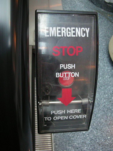 Emergency Button covered by Safety Cap