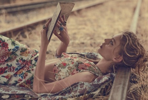Ondria Hardin reading an antique map in ‘Last Train’ for Vogue Australia, March 2016. Ph