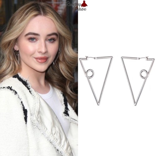 Leaving the SOHO Hotel, London.Sabrina wore a pair of Jenny Bird ‘The Verse Earrings’ ($75) leaving 