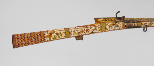 A magnificently decorated matchlock rifle originating from India, 18th century.  Note the square bor