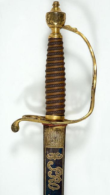 art-of-swords:Naval Presentation SwordDated: 18th century (1780-90 hilt)Culture: German blade of French type, English hiltMedium & Technique: blued etched and giltInscription: ‘SOLINGEN’ and in Latin and FrenchSource: Copyright © 2015 The Fitzwilliam