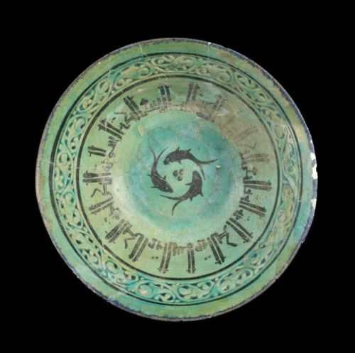 A Kashan pierced and incised underglaze-painted pottery Bowl Persia, 12th Century