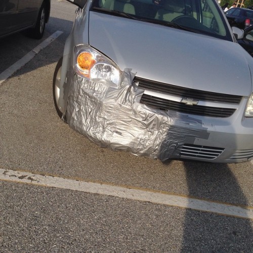 kingsofkings:  The #struggle is all the way #real. #ducktape damn near the whole front end (at Bob Carpenter Center)  That’s not good for the engine. They covered up half the lower grille which is where most of the cooling air for the radiator comes