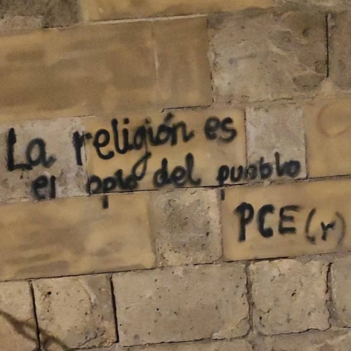 “Religion is the opium of the people" In Albaicin-Granada, Spain