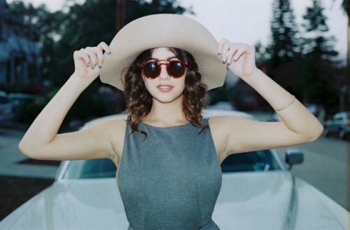 americanapparel:  Taylor wearing the Wool Floppy Hat, Vintage Eyewear By American Apparel, The Ponte Sleeveless Skater Dress, Invisi-Thong, and Wooden Heel Sandal. 