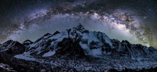 oneshotolive:  A friend of mine, 10 years ago, spent the night atop an adjacent peak to shoot this amazing shot of Mount Everest in the embrace of the Milky Way [OC] [3023x1386] 📷: chum1ly 