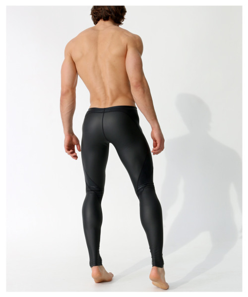 rufskin:  New Style Alert: KANG Performance tights constructed from a flat finish “rubber-look” poly-spandex blend featuring 4-way stretch. Focal point of design: a contrasting yoke panel, composed of stretch nylon-spandex with a shiny finish, swooping