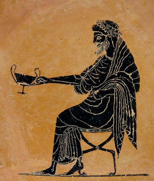 dionysia-ta-astika:Seated Dionysos holding out a kantharos Interior from an Attic black-figured plat