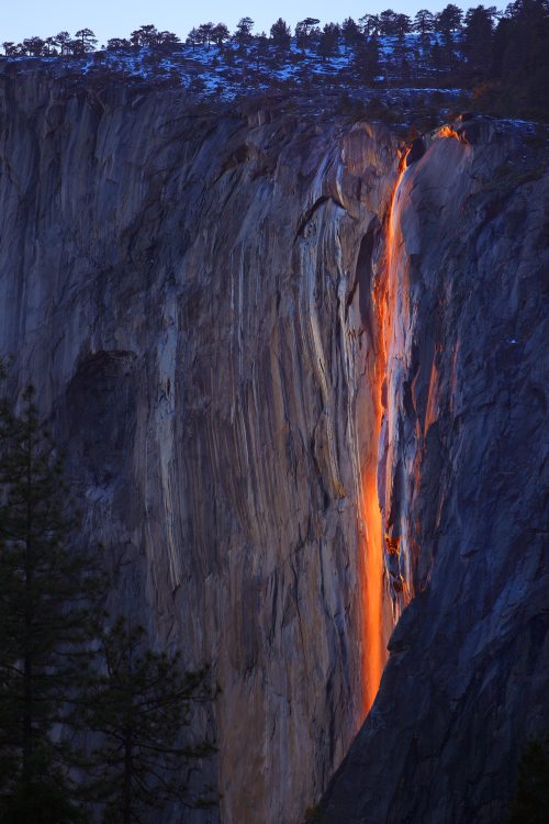 The setting sun illuminates Horsetail Falls in Yosemite National Park. Photo by Phil Hawkins/Reuters