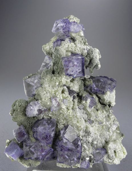 fuckyeahmineralogy:  Fluorite and Muscovite; Yaogangxian Mine, Hunan Province, China
