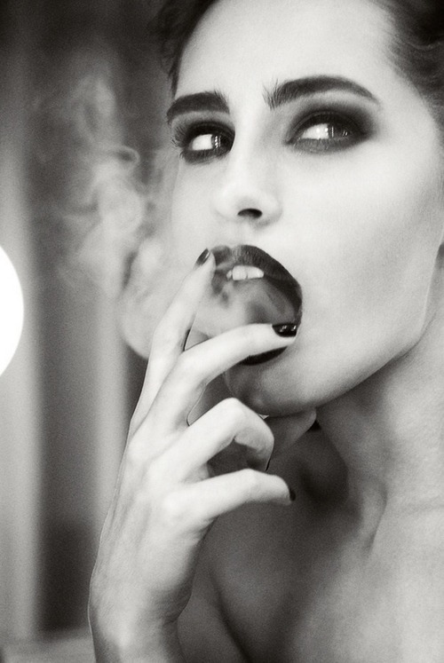 Her intelligence dissipated through her mouth in a plume of smoke, leaving behind