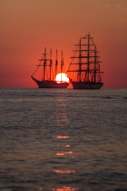 monkeyboy1387:    Tall ships on the Bay, at sunset.   