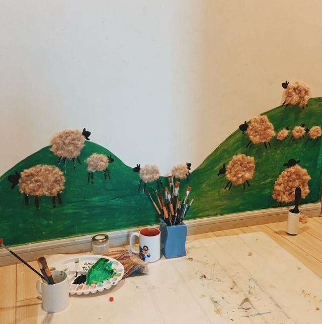A small sheep wall I made last week with acrylic paints and fluff from a kapok fruit. #my art#painting#mural#sheep#diy#acrylic#meadow