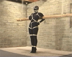 therubberdollowner: http://therubberdollowner.tumblr.com This is hands down one of my favourite Gif series from Lipstixxx.  Though there is no latex, the white shibari rope is beautiful against the black zentai and you can see the effectiveness of the