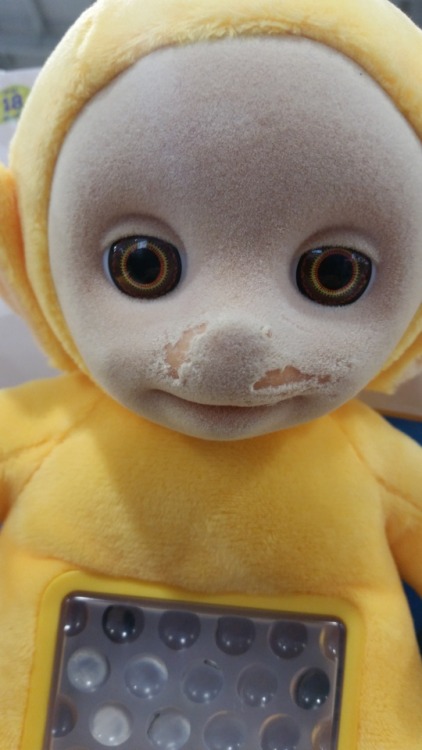 This Teletubby toy has seen better days