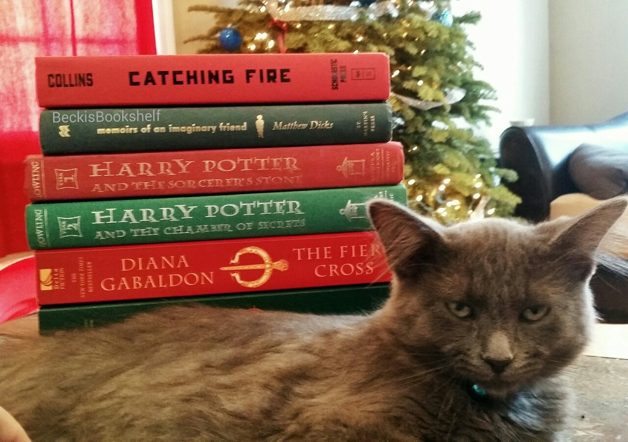 beckisbookshelf:  I wanted Fred to pose with some books today. He wanted me to go