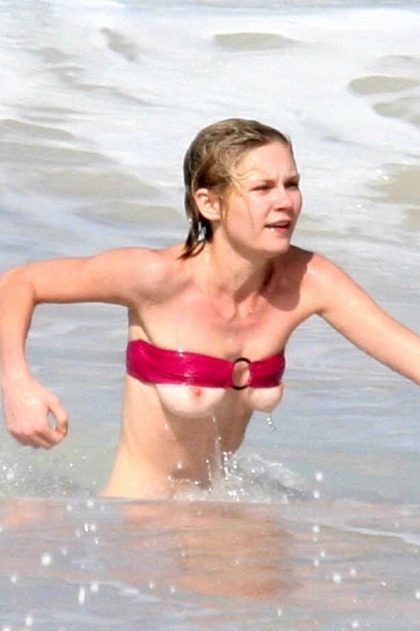 Kirsten Dunst falls out of her bikini top in St. Bartâ€™s, Caribbean (January