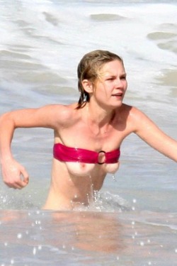 Kirsten Dunst Falls Out Of Her Bikini Top In St. Bartâ€™S, Caribbean (January