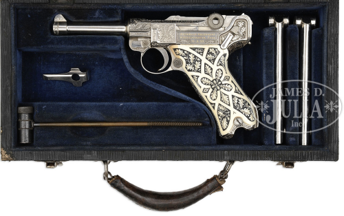 Rare cased, platinum plated Hermann Krieghoff presentation Luger with ivory grips, circa 1939.Estima