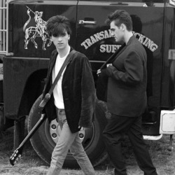 drowningparty:Johnny Marr and Morrissey at Glastonbury, 1984. Photo: Paul Norris.