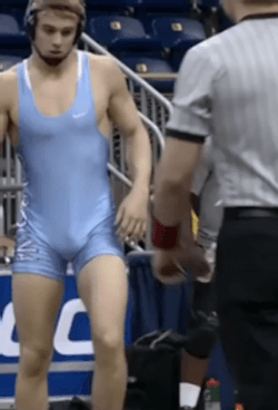 wrestlerinsinglet:College wrestler tugging at his singlet gif