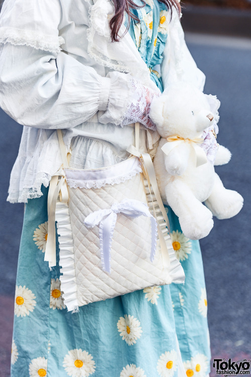 19-year-old Japanese student Rio on the street in Harajuku with purple twintails, a vintage top over