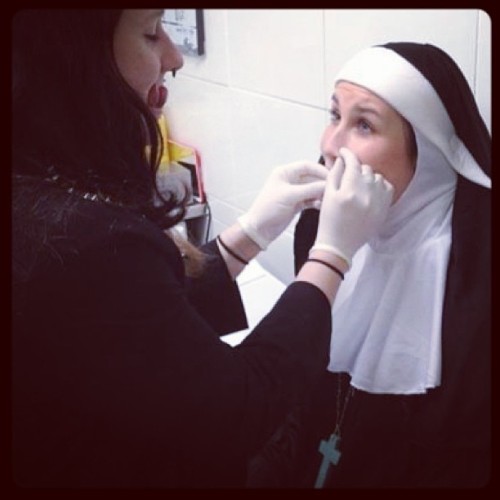 ashthorn:  Just another day at work #piercing #pierced #nun #sister #habit #nose #pierce #piercedgirls #blackdragon #tattooing #catholic #christian #crucifix #angel #devil #splittongue #good #evil