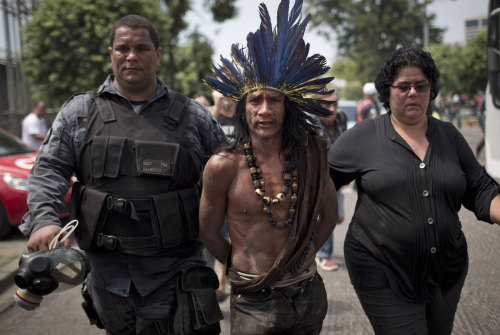 racism-sexist-ableism-ohmy:  duckyshepherd:  carnivaloftherandom:  rishu-jpn:  Brazilian police clash with indigenous groups protesting World Cup.  This is important.  The only kind of thing I’ll be posting about the World Cup  We will not see this