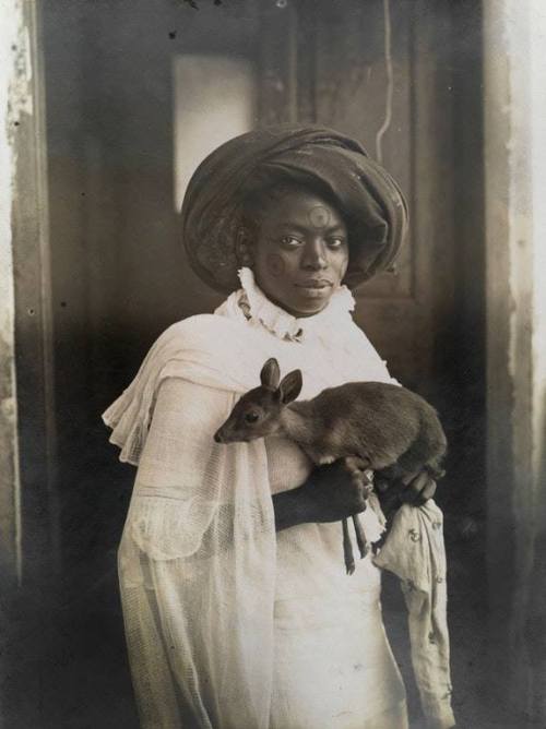 clearwatermadonna:criticalmera:Young Kenyan woman holding a dik-dik, Mombasa 1909This is my favorite