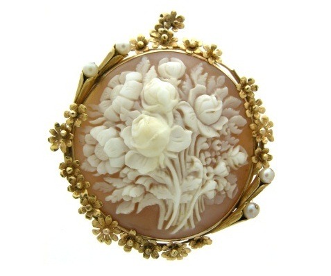 highvictoriana:Late Victorian shell cameo brooch depicting bouquet of flowers, c. 1880.