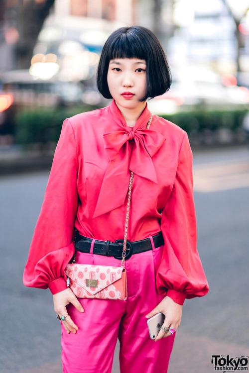 19-year-old Tokyo music school student Shoko on the street in Harajuku wearing an all pink mostly vi