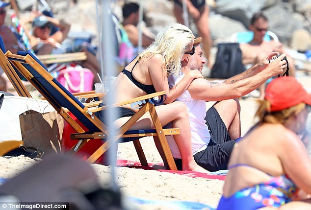 xojoanne:  July 1: Lady Gaga &amp; Christian Carino at a beach in the Hamptons.