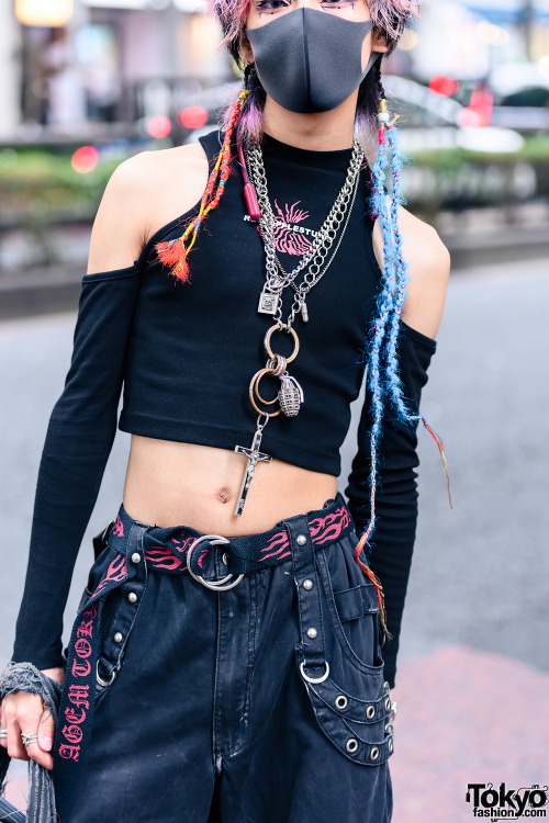 Japanese hair stylist Isana on the street in Harajuku. He&rsquo;s wearing a Never Mind the XU crop t