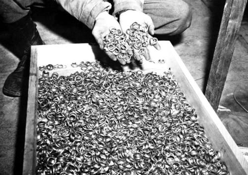 historicaltimes:Wedding rings of Holocaust victims, near the Buchenwald concentration camp, 1945. vi