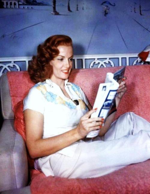 Jane Russell reading at home.At the height of her career, Russell started the &ldquo;Hollywood Chris