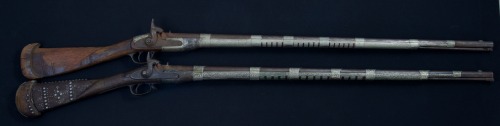 A pair of Arab decorated Enfield M1853 percussion muskets, mid 19th century.