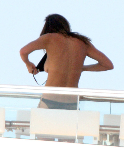 toplessbeachcelebs:  Cindy Crawford (Model) sunbathing topless in Sardinia, Italy (August 2008)