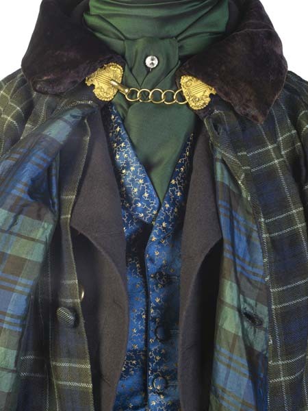 Detail of a man’s outfit from the 1830s. The outfit consists of a necktie and pin, shirt, silk