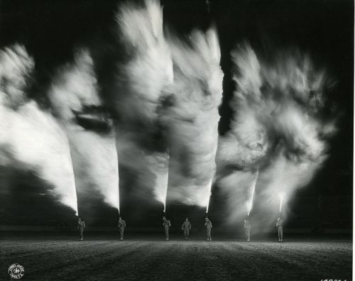 historicaltimes:Soldiers demonstrate their flamethrowers at the New Orleans Army War Show, 1942 via 