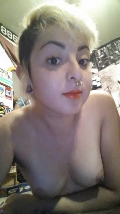 pullourteethout:  Orange lipstick makes me look even more pale than I already am.